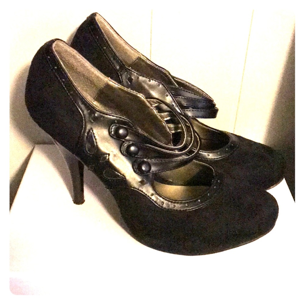 Black faux suede and leather high heels.